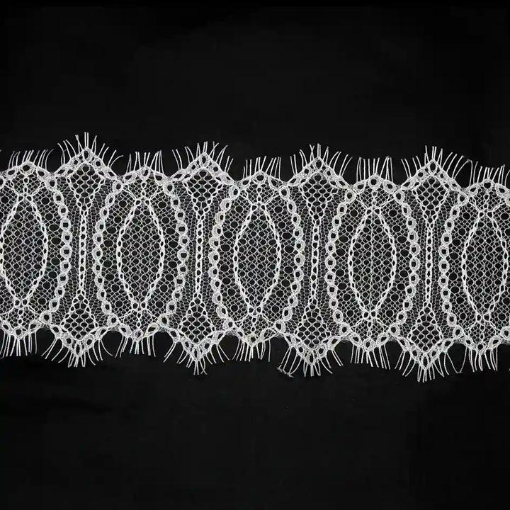 Elegant Eyelash Lace Trim in white fabric perfect for dresses and crafts by Ani Accessories