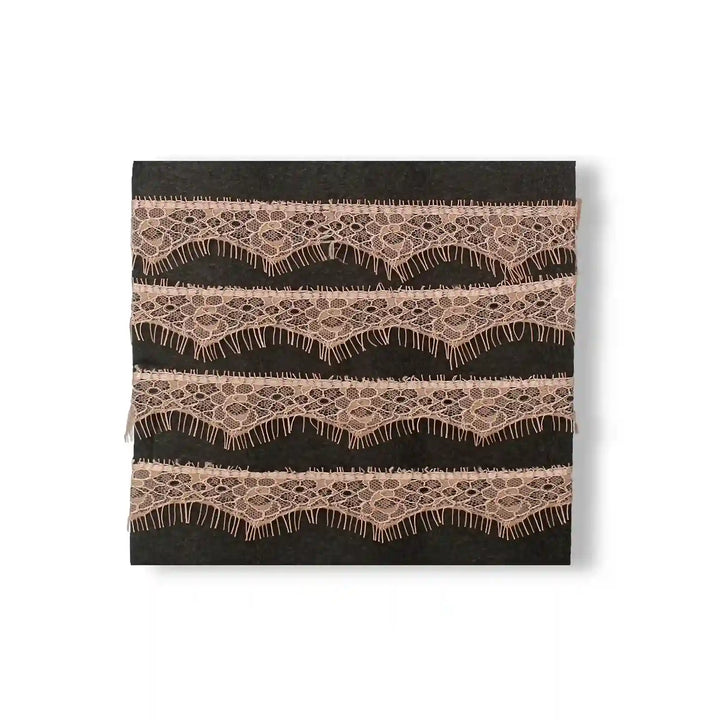 Buy now Peach Eyelash Trim Lace Fabric by Ani Accessories with delicate wave patterns and fringing details