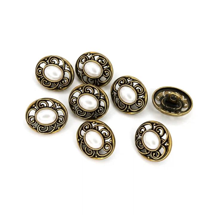 ANI Accessories set of antique gold oval scroll buttons with pearl-look centres scattered on white, front and back views 
with white color background 