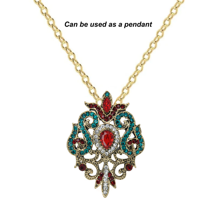 ANI Accessories baroque revival brooch worn as a pendant on a gold chain 