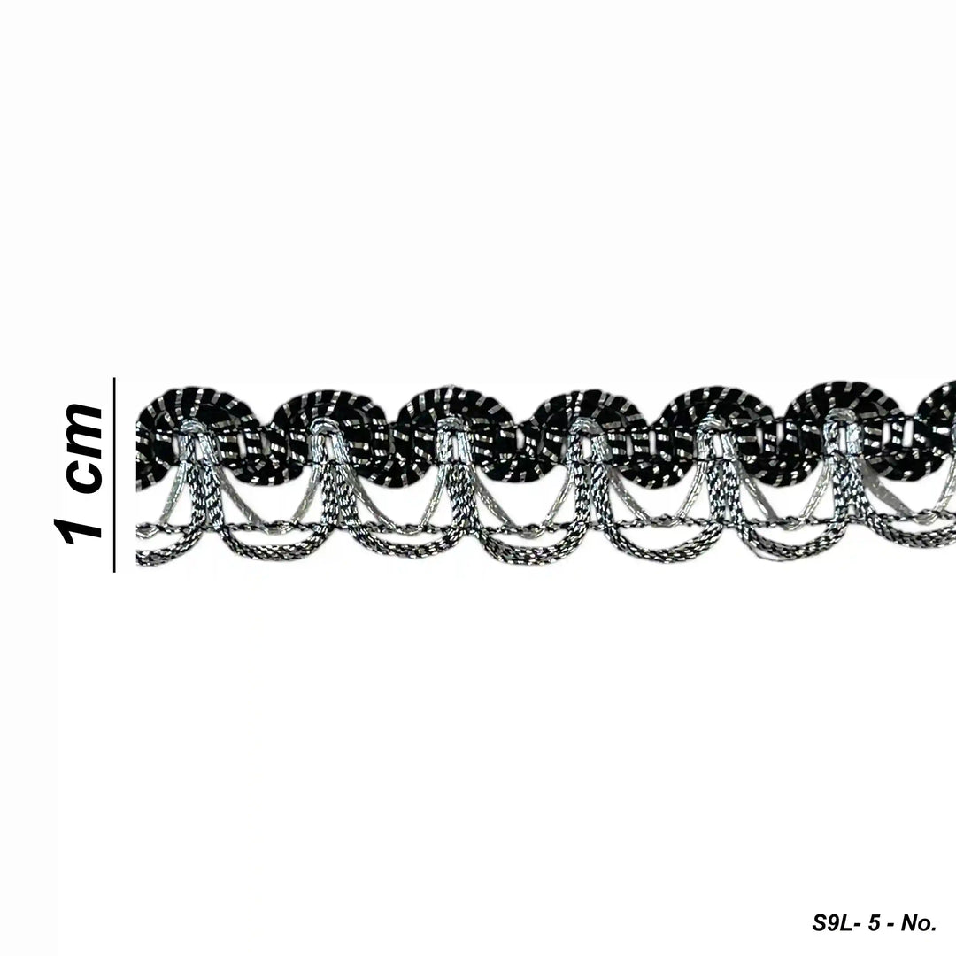 ANI Accessories black and silver lace laid in two strips on white background 