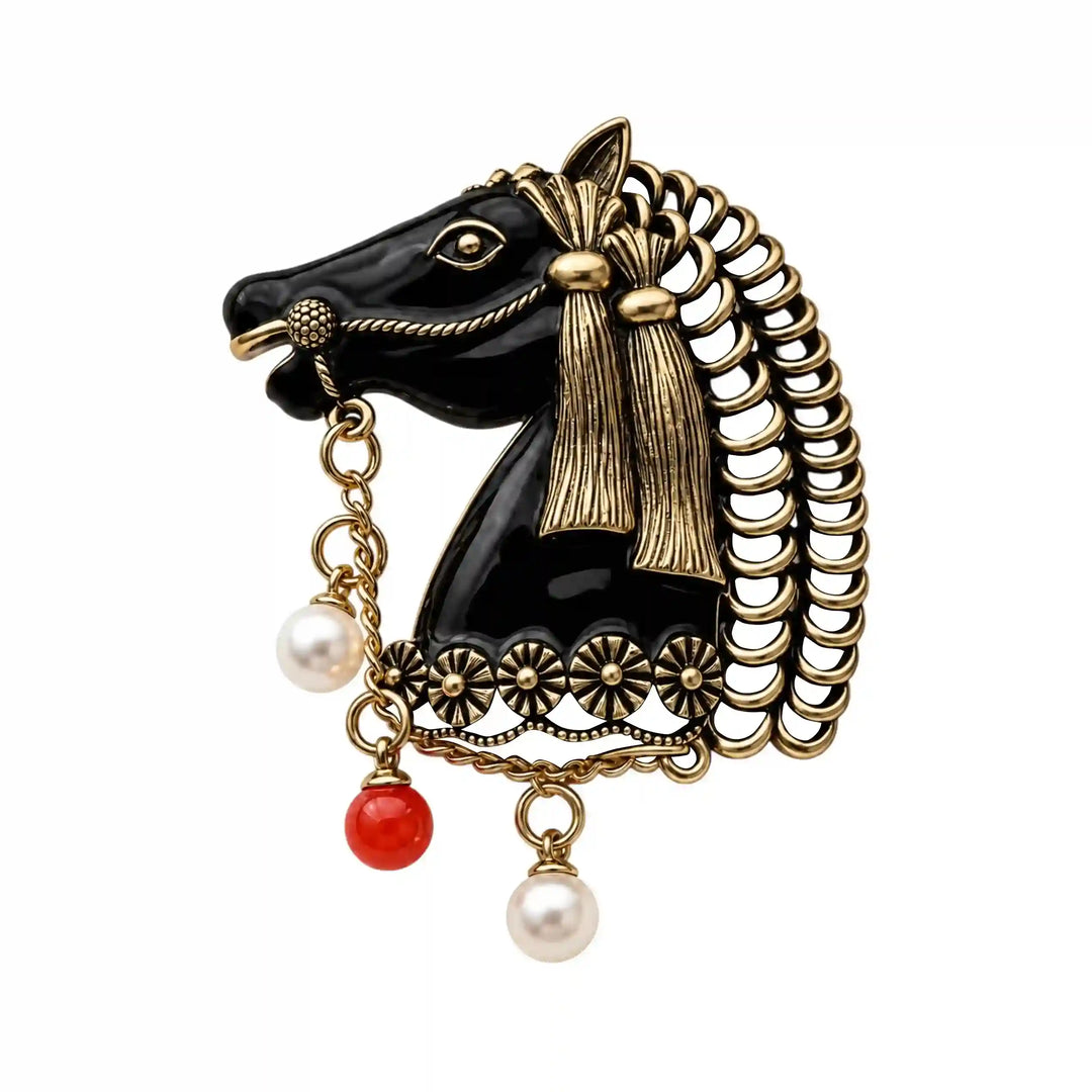 ANI Accessories black horse head brooch with antique gold mane and pearl drops with white color background 