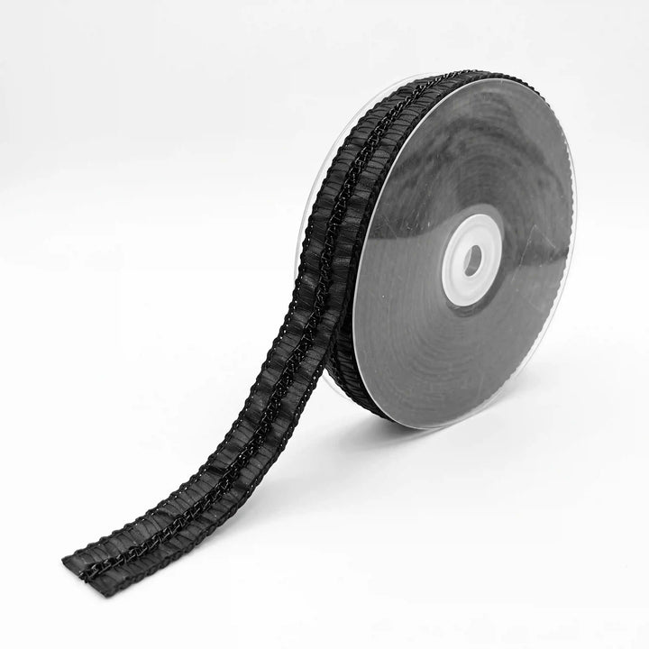 ANI Accessories black lace for clothes with metal chain and faux leather, laid flat with white color background 