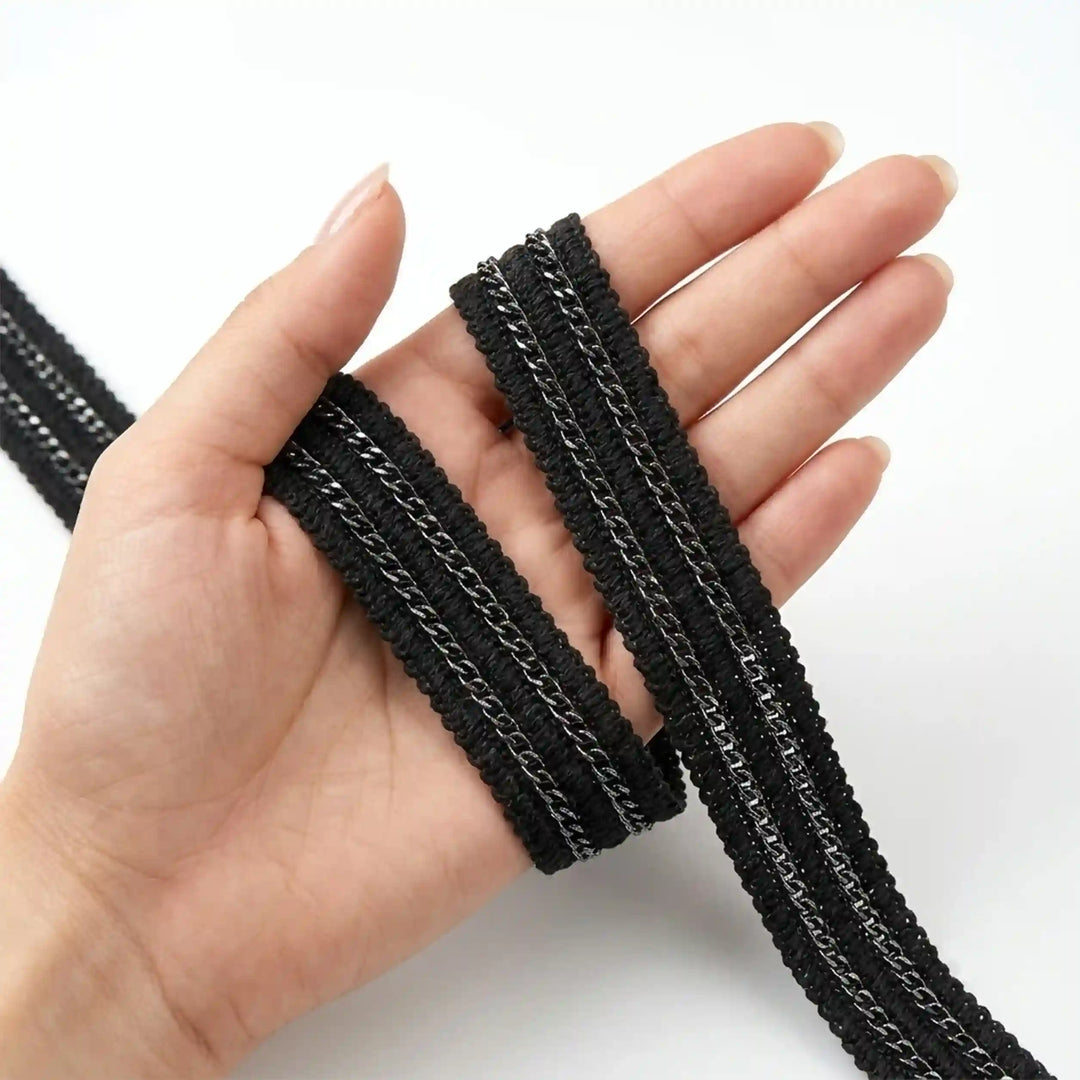 ANI Accessories black metal chain lace held in hand to show the double chain with white color background 