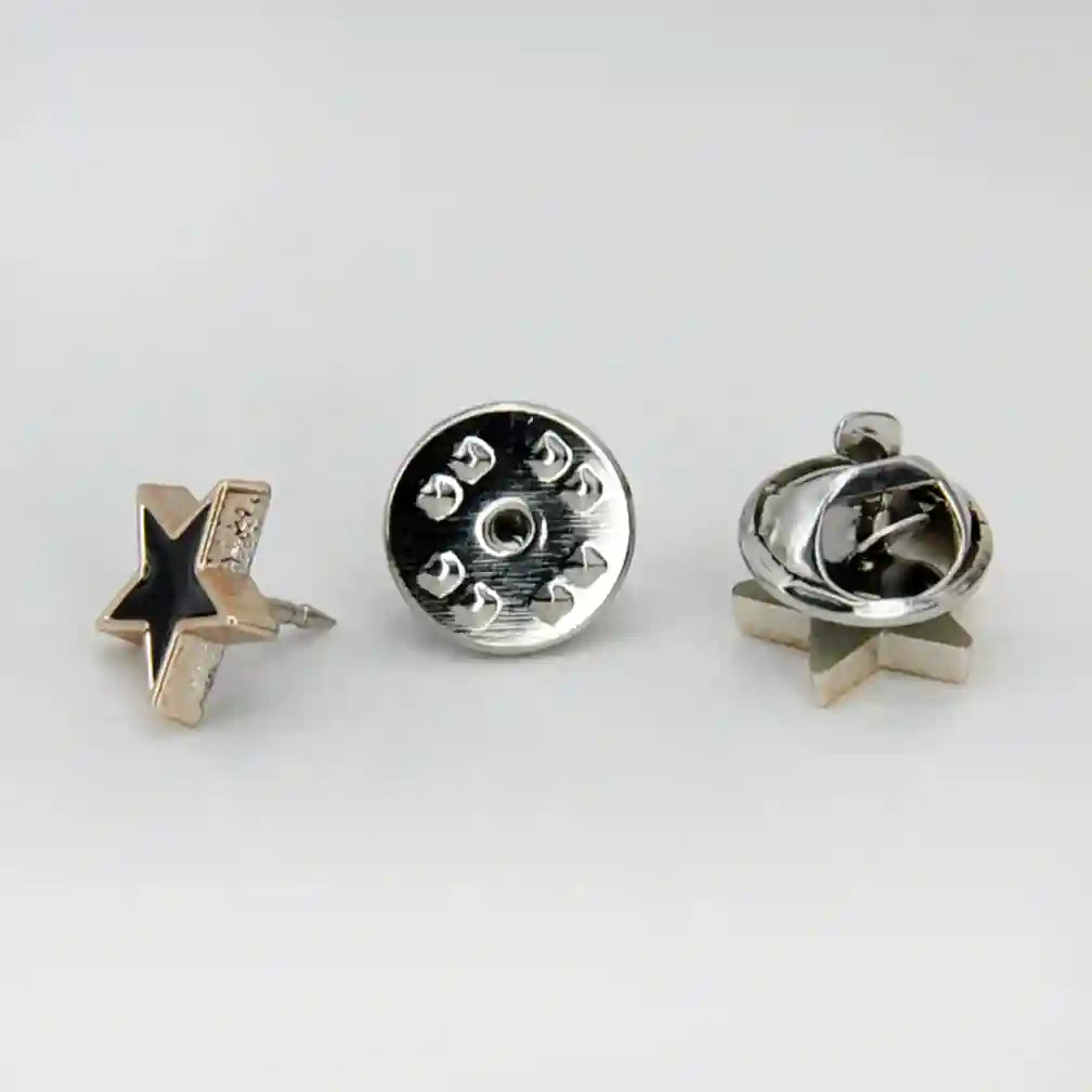 ANI Accessories black star enamel pin shown from the side with its butterfly clutch back with white color background 