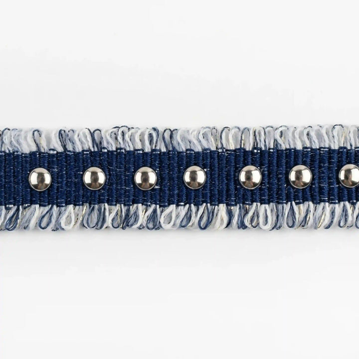 ANI Accessories blue denim lace for jeans with silver metal studs, laid flat with white color Background 