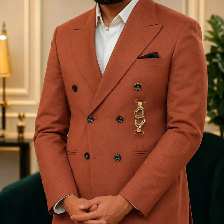 ANI Accessories gold coat buckle used as the front closure on a rust double-breasted blazer 