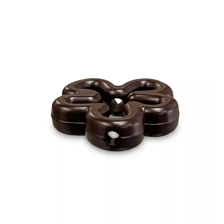 ANI Accessories dark brown five-petal flower charm, low-angle view showing the drilled through-hole across opposite petals