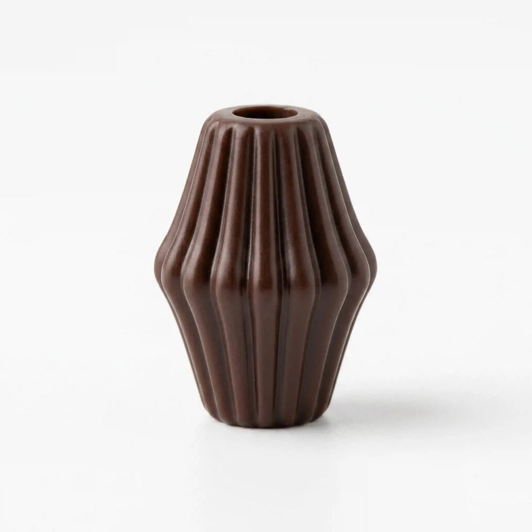 ANI Accessories dark brown melon cord end bead with deep vertical fluting and centre hole, standing upright on white 
Background 