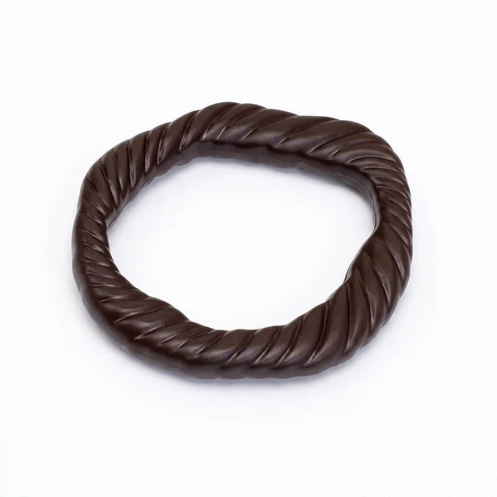 ANI Accessories dark brown twisted rope ring buckle lying flat, low side view of the spiral rope twist on white background 