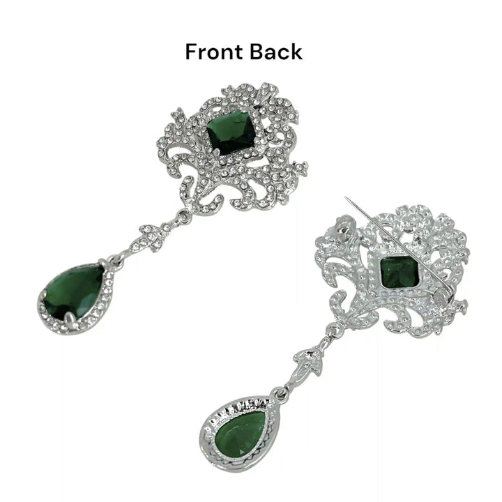 ANI Accessories emerald and silver brooch showing the front and the back with pin color background 