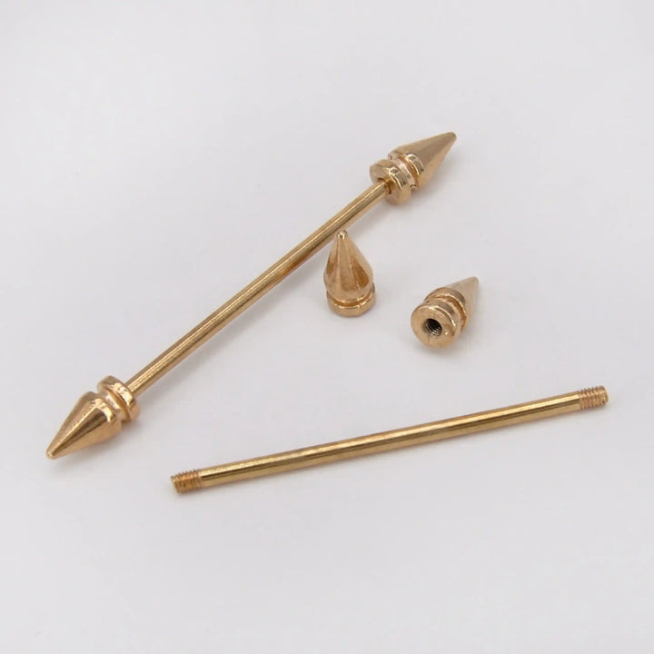 ANI Accessories gold collar bar with one spike end removed to show how it fits through the collar 