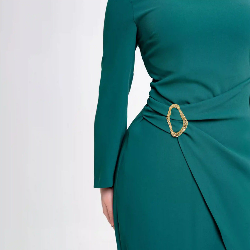 ANI Accessories gold hammered freeform buckle gathering the side waist of a teal green dress
