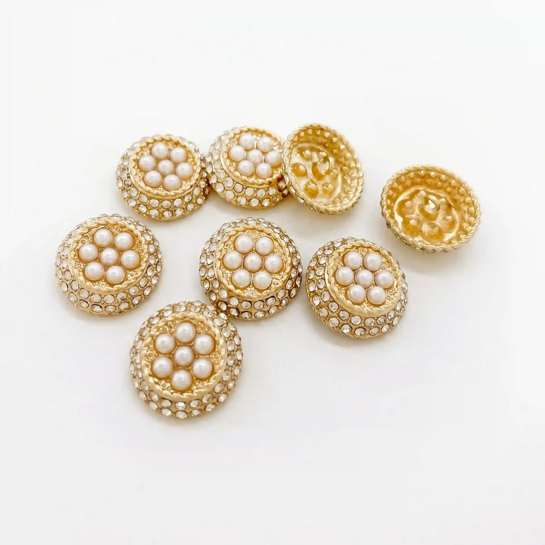 ANI Accessories set of 8 gold rhinestone shank buttons with pearl-look cluster centres on white, fronts and backs  with white color background
