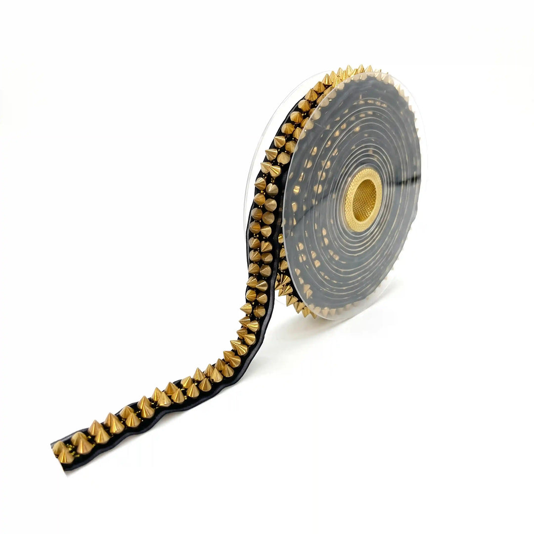 ANI Accessories gold stud metal eyelet lace on black net tape, on a roll, 1.5 cm wide with white color Background  