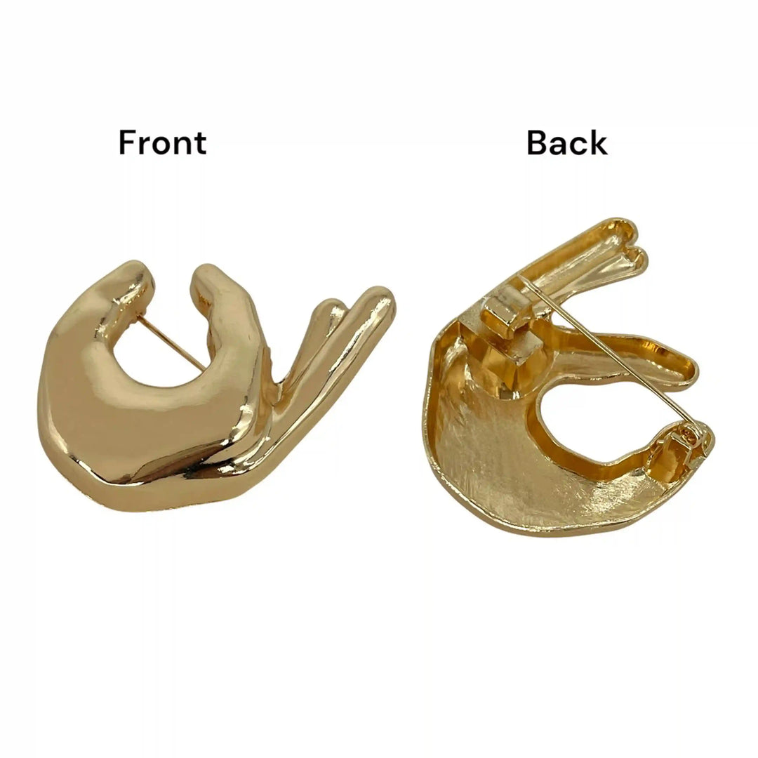 ANI Accessories hand brooch pin showing the front design and the pin on the back white color background 