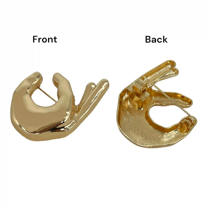 ANI Accessories hand brooch pin showing the front design and the pin on the back white color background 