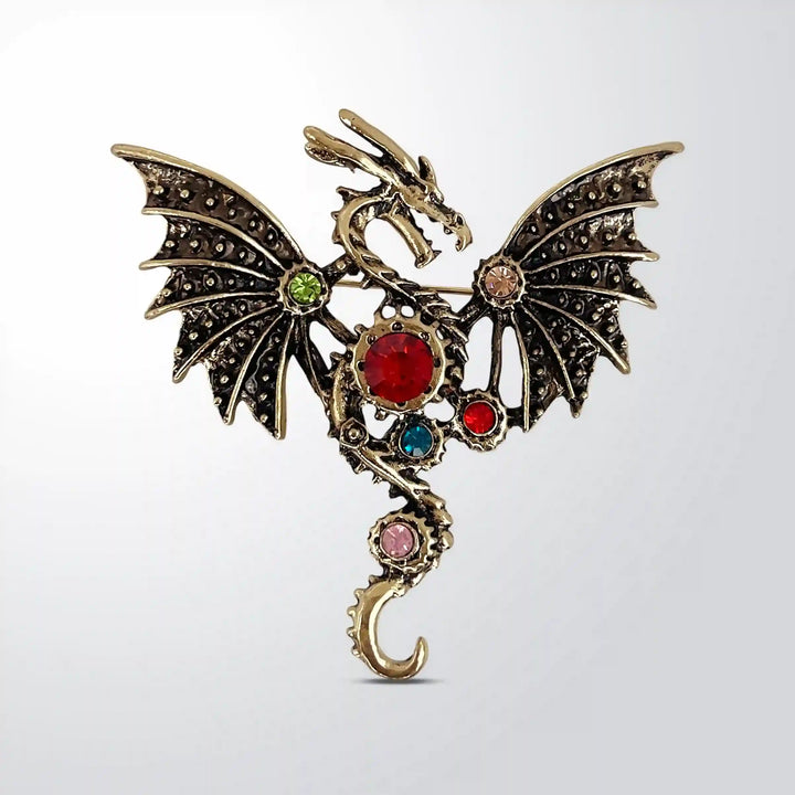 ANI Accessories jeweled dragon brooch for men in antique gold with spread wings and red, green and blue stones with white color background 