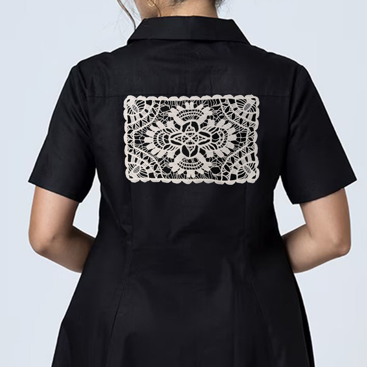 ANI Accessories large crochet back patch stitched on the back of a black shirt dress with white color background 