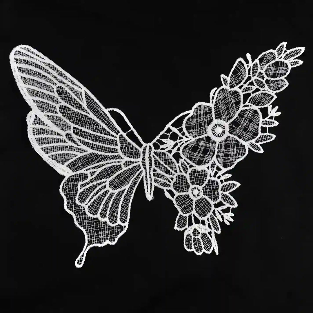 ANI Accessories large white butterfly guipure lace patch in spun poly, half wing and half flowers, on black background 