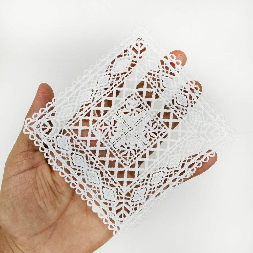 ANI Accessories large white lattice patch held in a hand to show its 6 inch size 