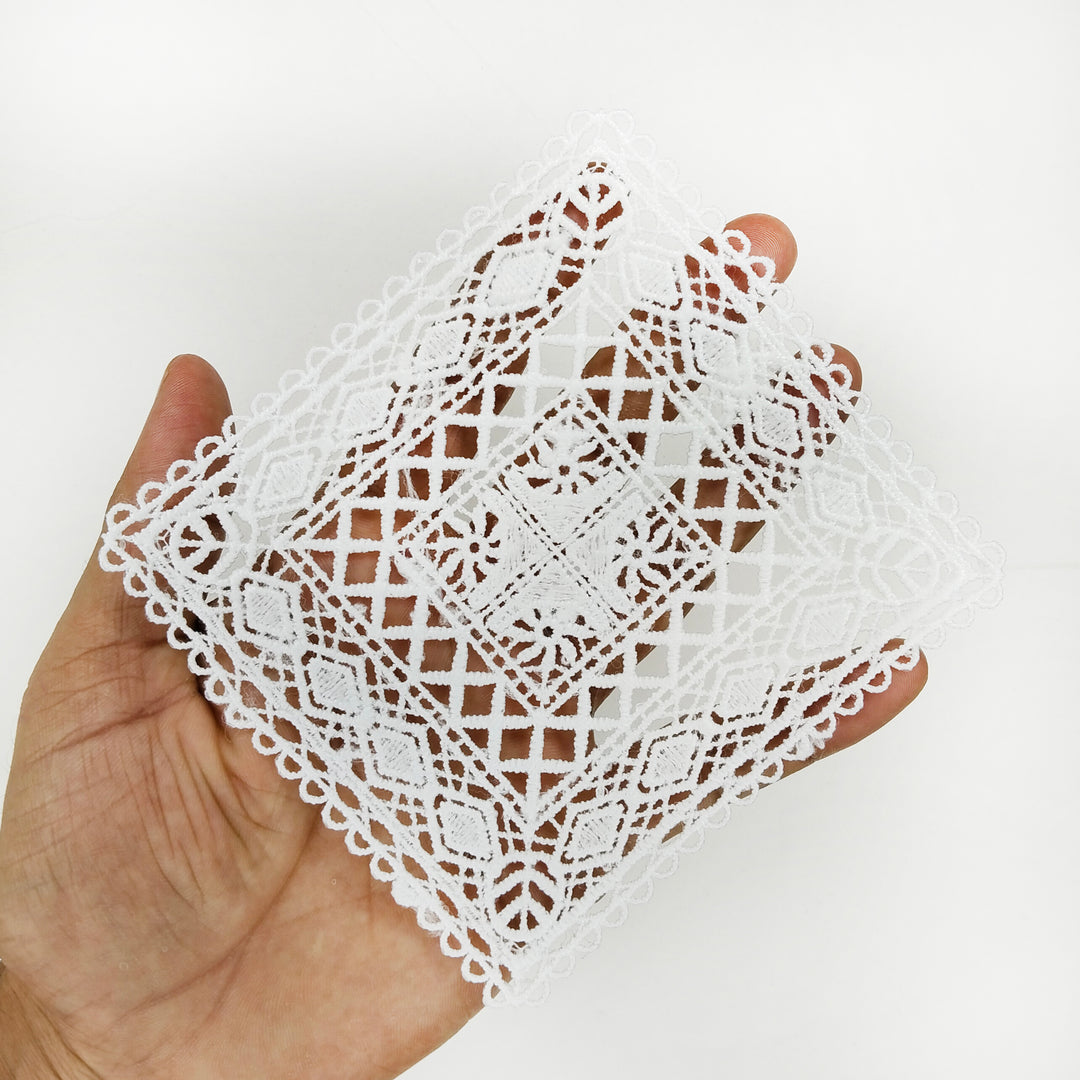 ANI Accessories large white lattice patch held in a hand to show its 6 inch size 
