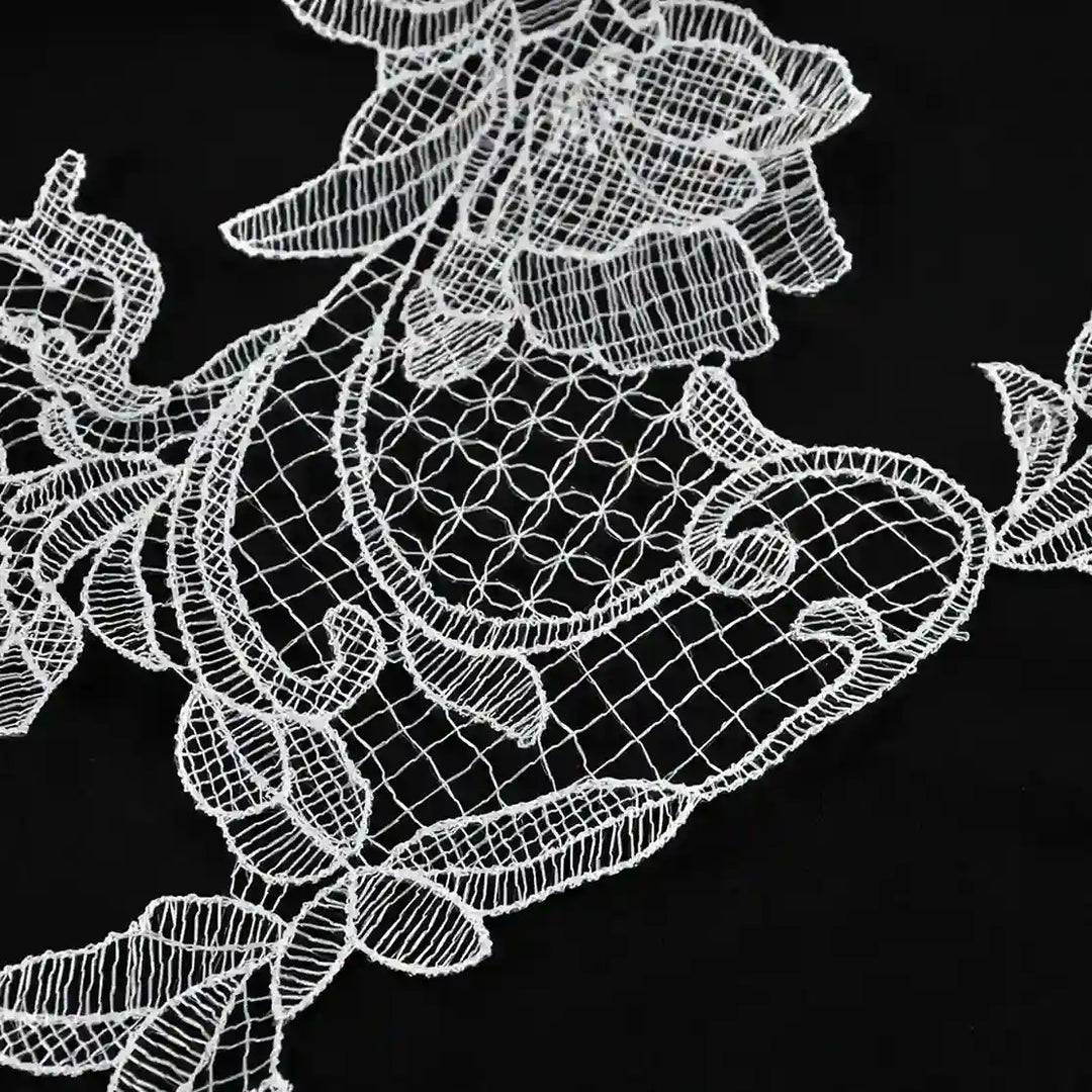 ANI Accessories close-up of the lattice-filled paisley and flowers on a white patch 