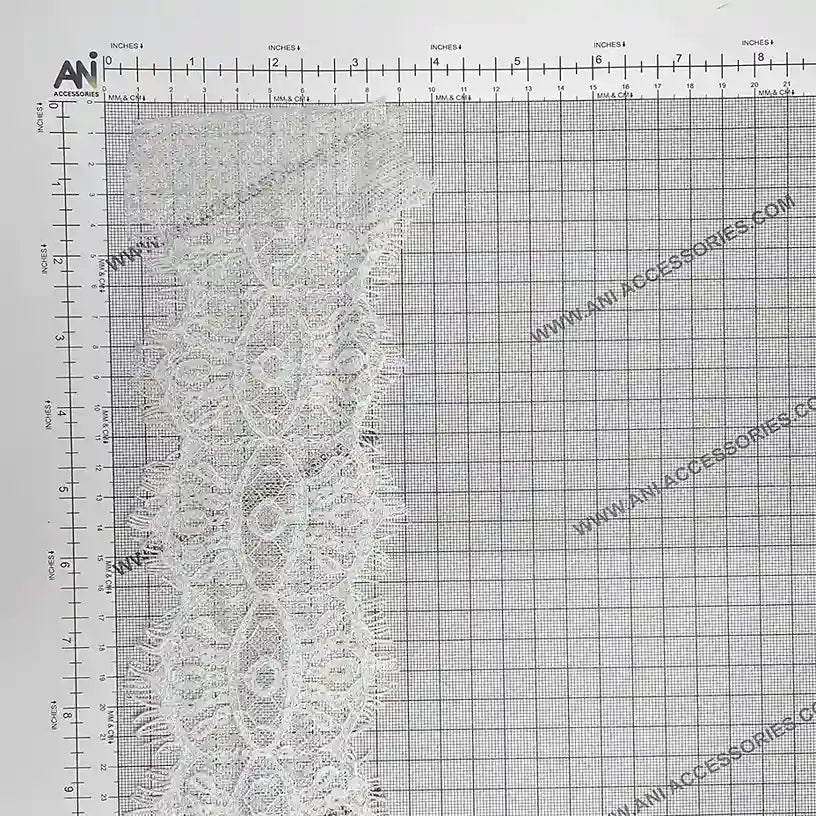 Scalloped Edge Eyelash Lace in delicate white, perfect for crafting and sewing projects