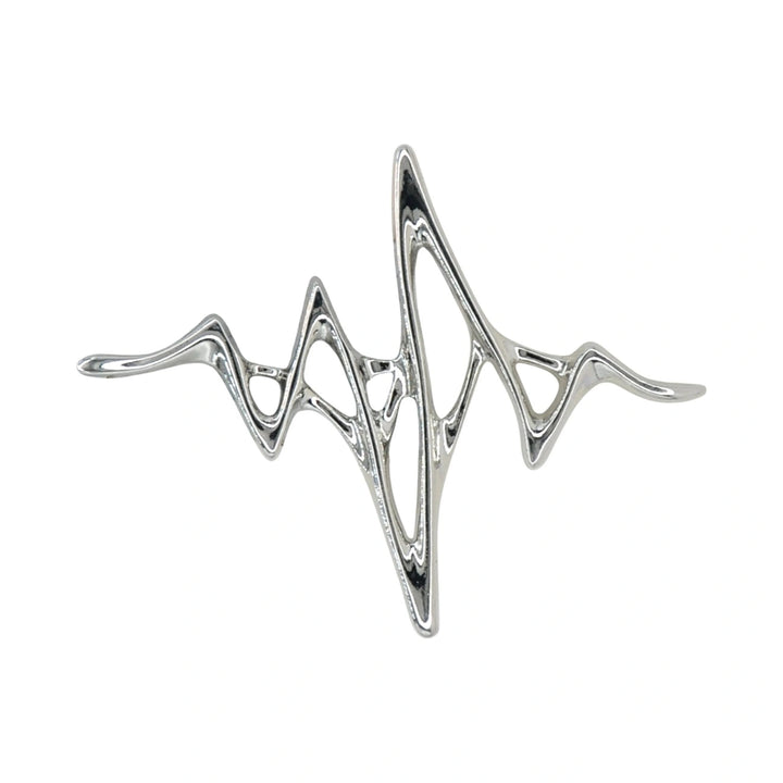 ANI Accessories silver metal brooch with abstract wave design, front view on white 