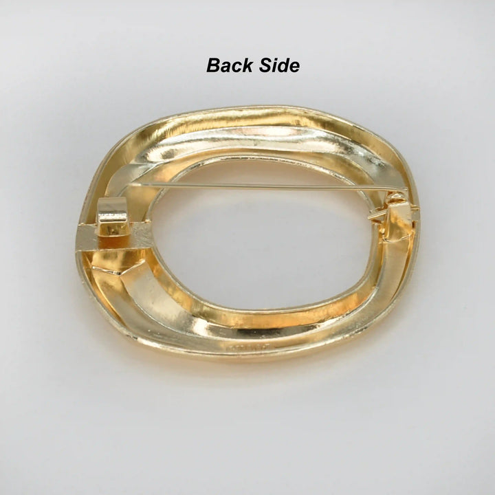ANI Accessories wavy gold circle brooch back side showing the pin 