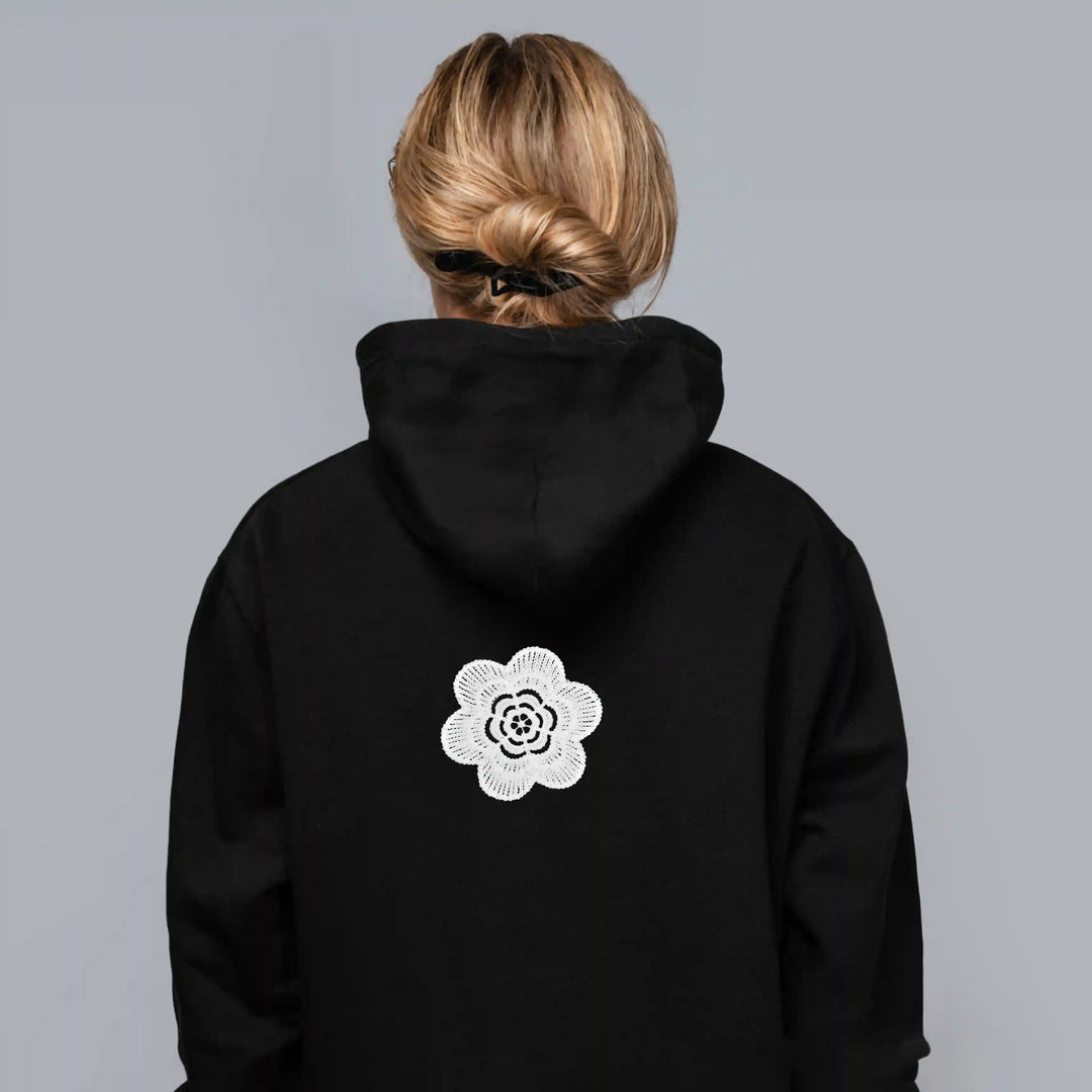 ANI Accessories white applique patch for clothes on the back of a black hoodie with gray color background 