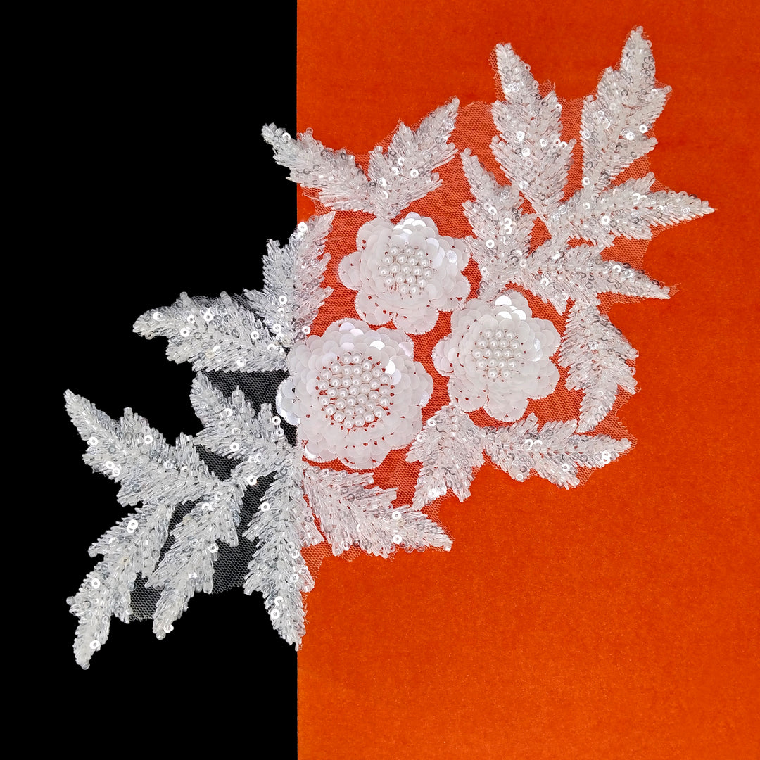 ANI Accessories white bead and sequin patch for clothes on a black and orange background