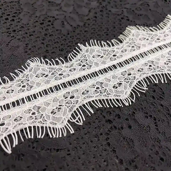 ANI Accessories close-up of the ladder band and floral lace on white Chantilly trim 