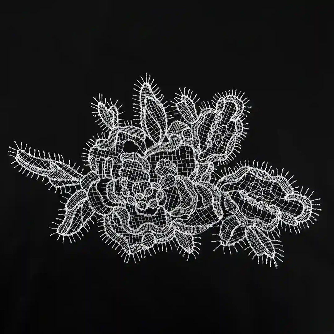 ANI Accessories white eyelash flower guipure lace patch in spun poly, 12 inch wide, on black background 