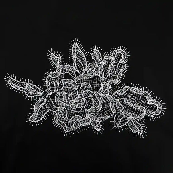 ANI Accessories white eyelash flower guipure lace patch in spun poly, 12 inch wide, on black background 