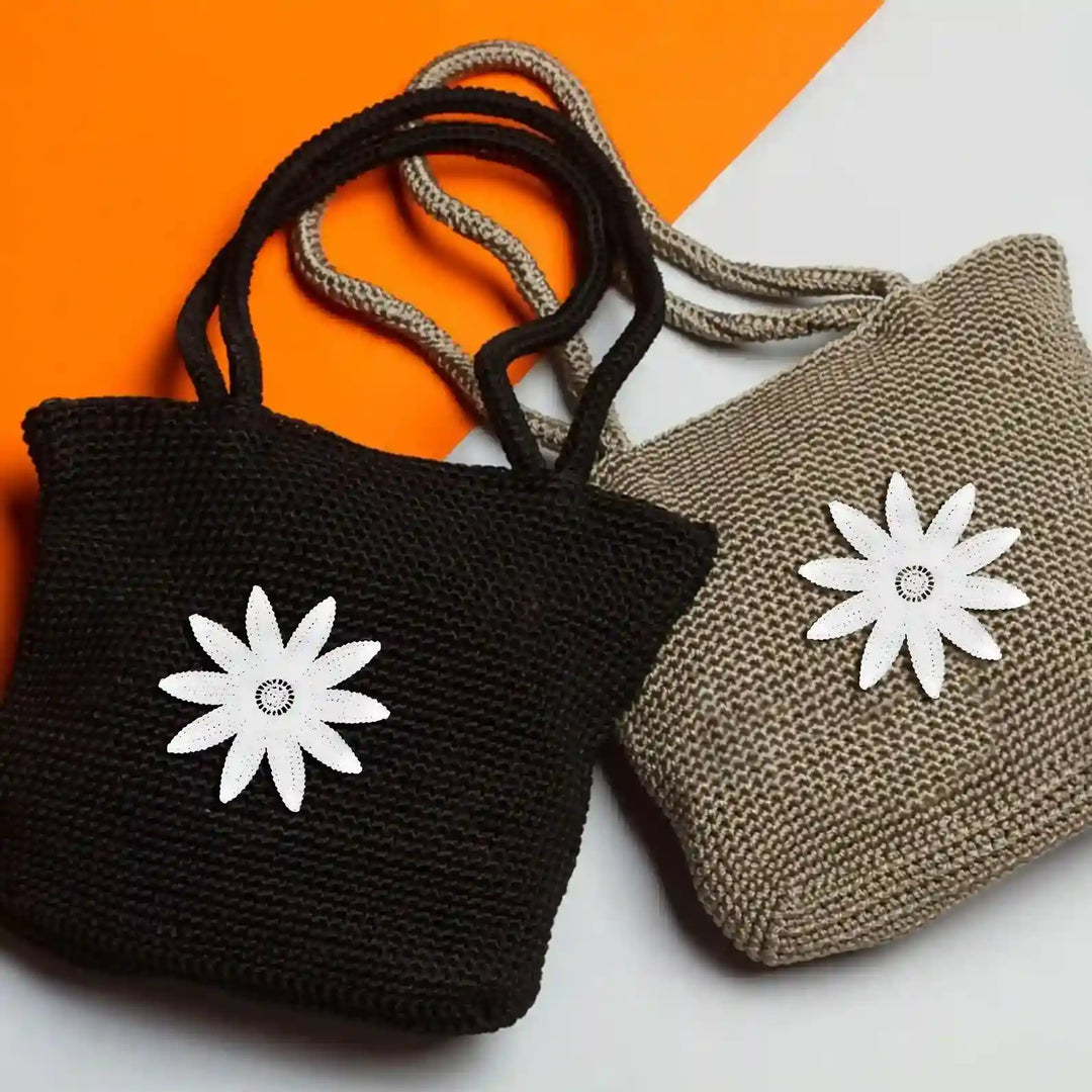 ANI Accessories white flower patches for bags on black and beige woven tote bags 