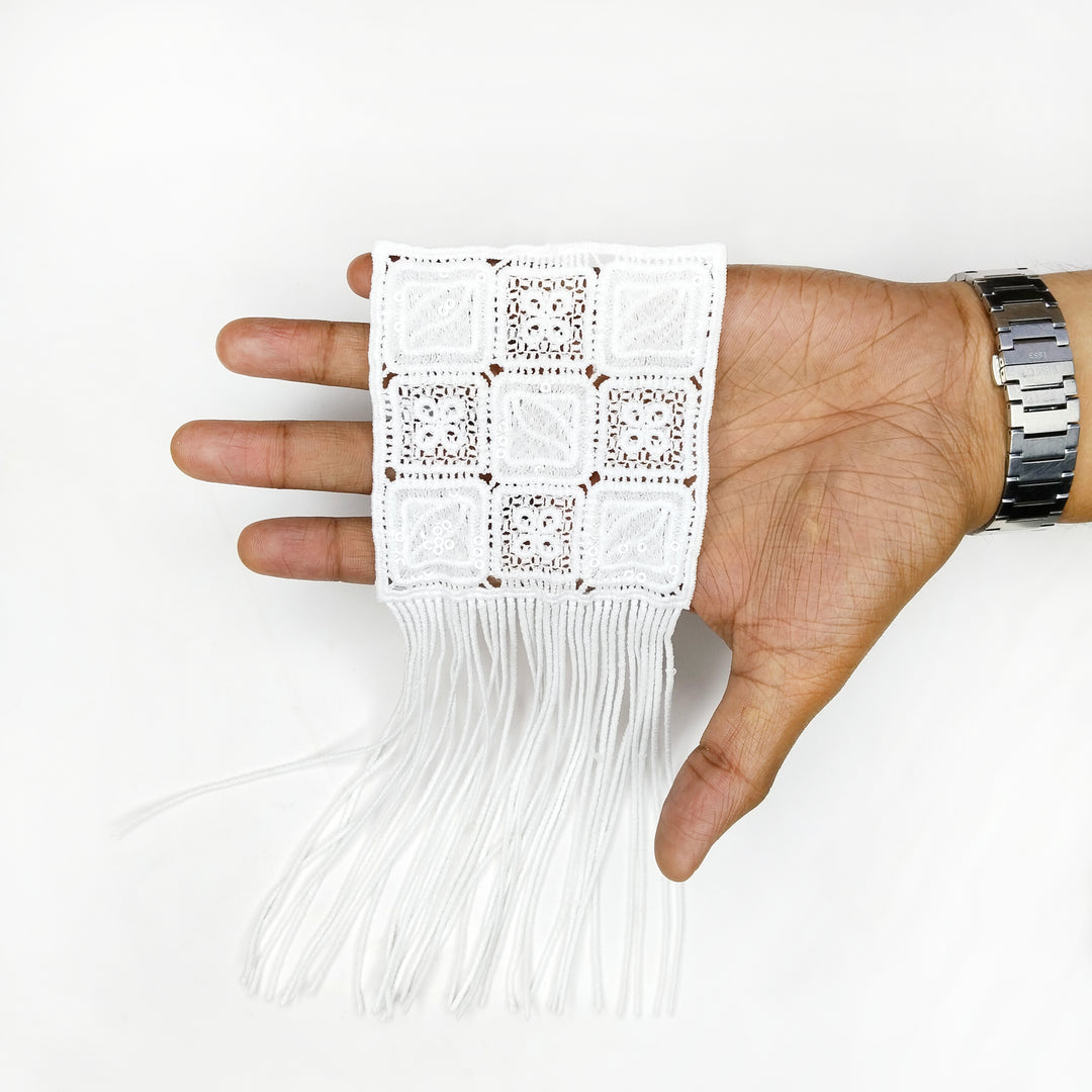 ANI Accessories white fringe patch draped over a hand to show the panel and fringe length 