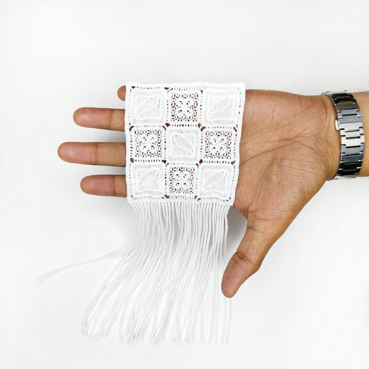 ANI Accessories white fringe patch draped over a hand to show the panel and fringe length 