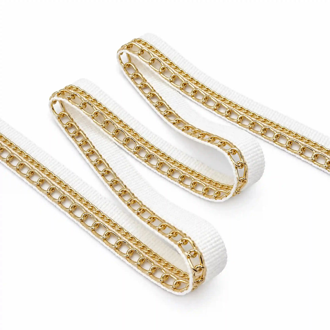 ANI Accessories white and golden lace with two gold chains, folded in a zigzag with white color background 