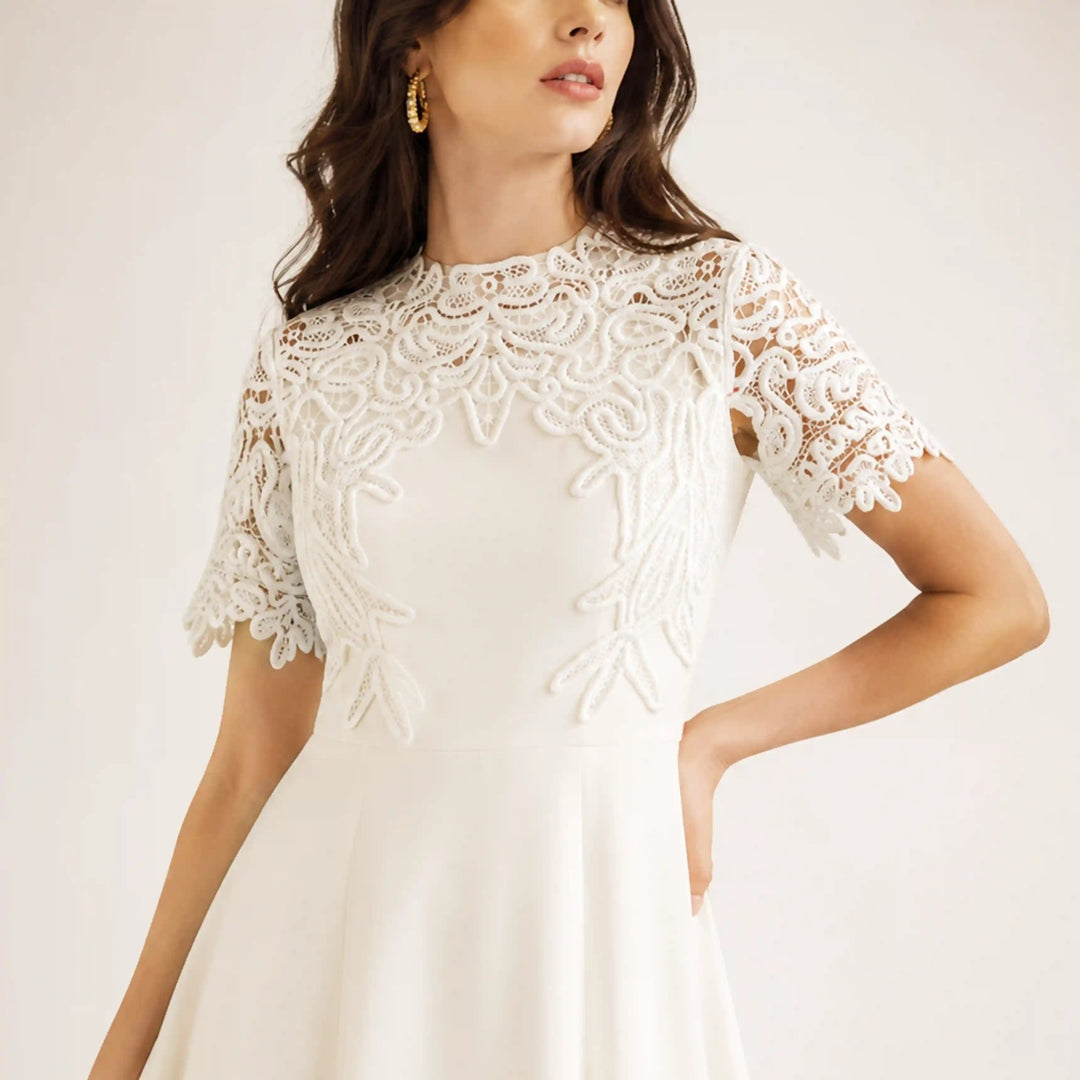 ANI Accessories white guipure lace yoke and sleeves on a model in a white dress for a white-on-white look 