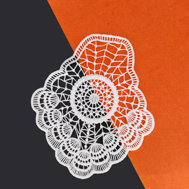 ANI Accessories white patch design for clothes on a black and orange background 