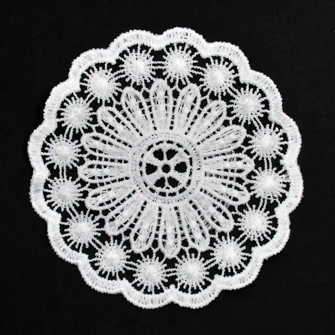ANI Accessories white round guipure lace patch in spun poly with daisy centre, on black Background 