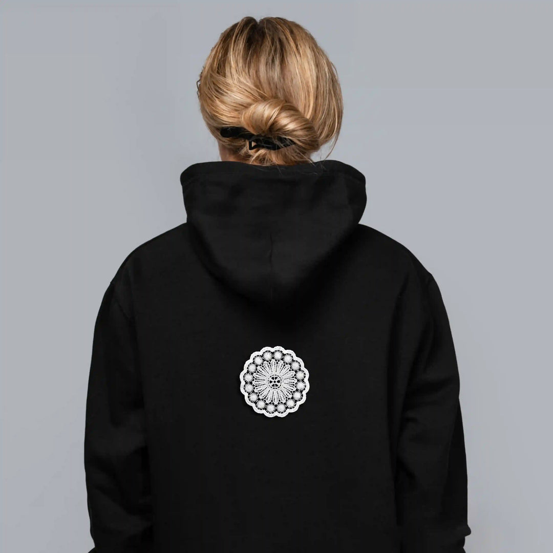 ANI Accessories white round patch for hoodies on the back of a black hoodie 