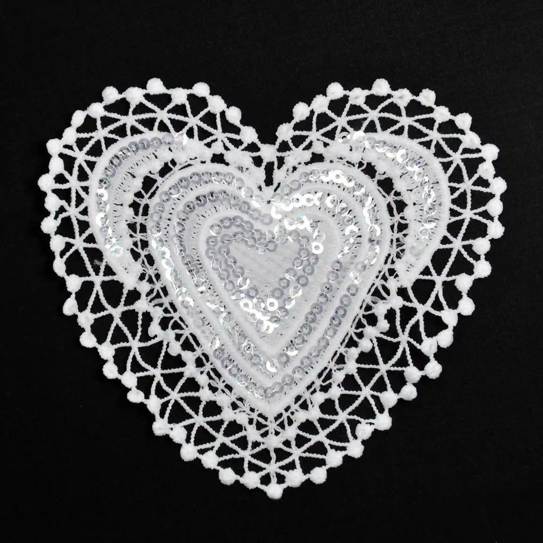 ANI Accessories white sequin heart patch in spun poly with zigzag border, on black Background 