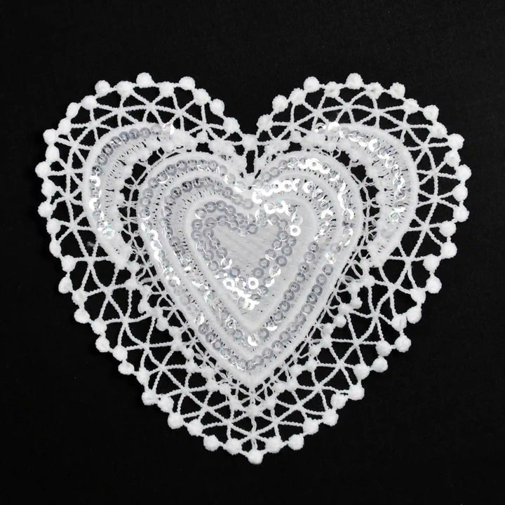 ANI Accessories white sequin heart patch in spun poly with zigzag border, on black Background 