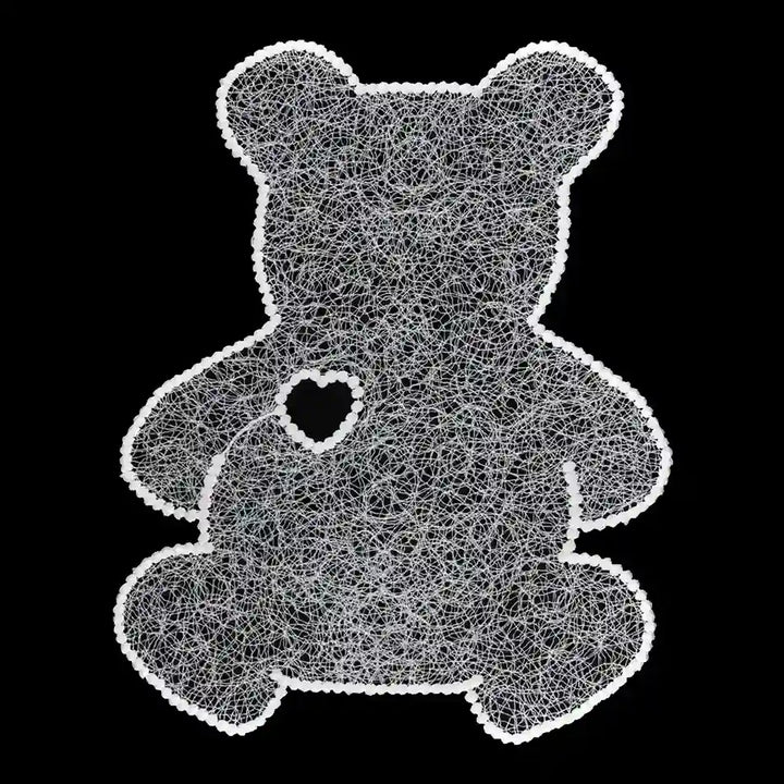 ANI Accessories white teddy bear guipure lace patch in spun poly with a heart cut-out, on black background 