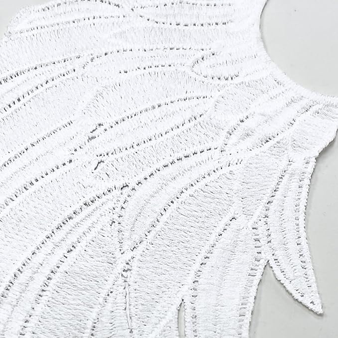 ANI Accessories close-up of white spun poly wing patch showing the layered feather lines 