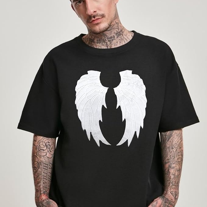 ANI Accessories white wings patch for t-shirt on the front of a black tee worn by a man With white color background 